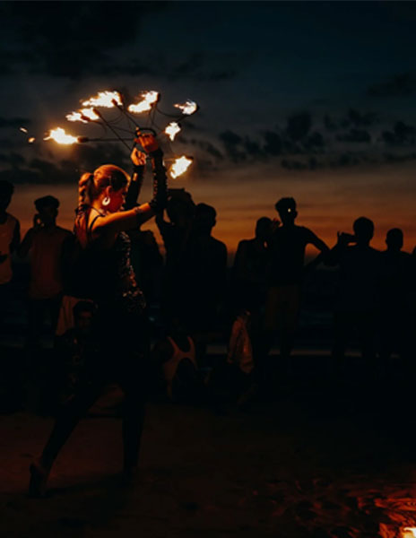Girl showing her fire skills at Goa Beach